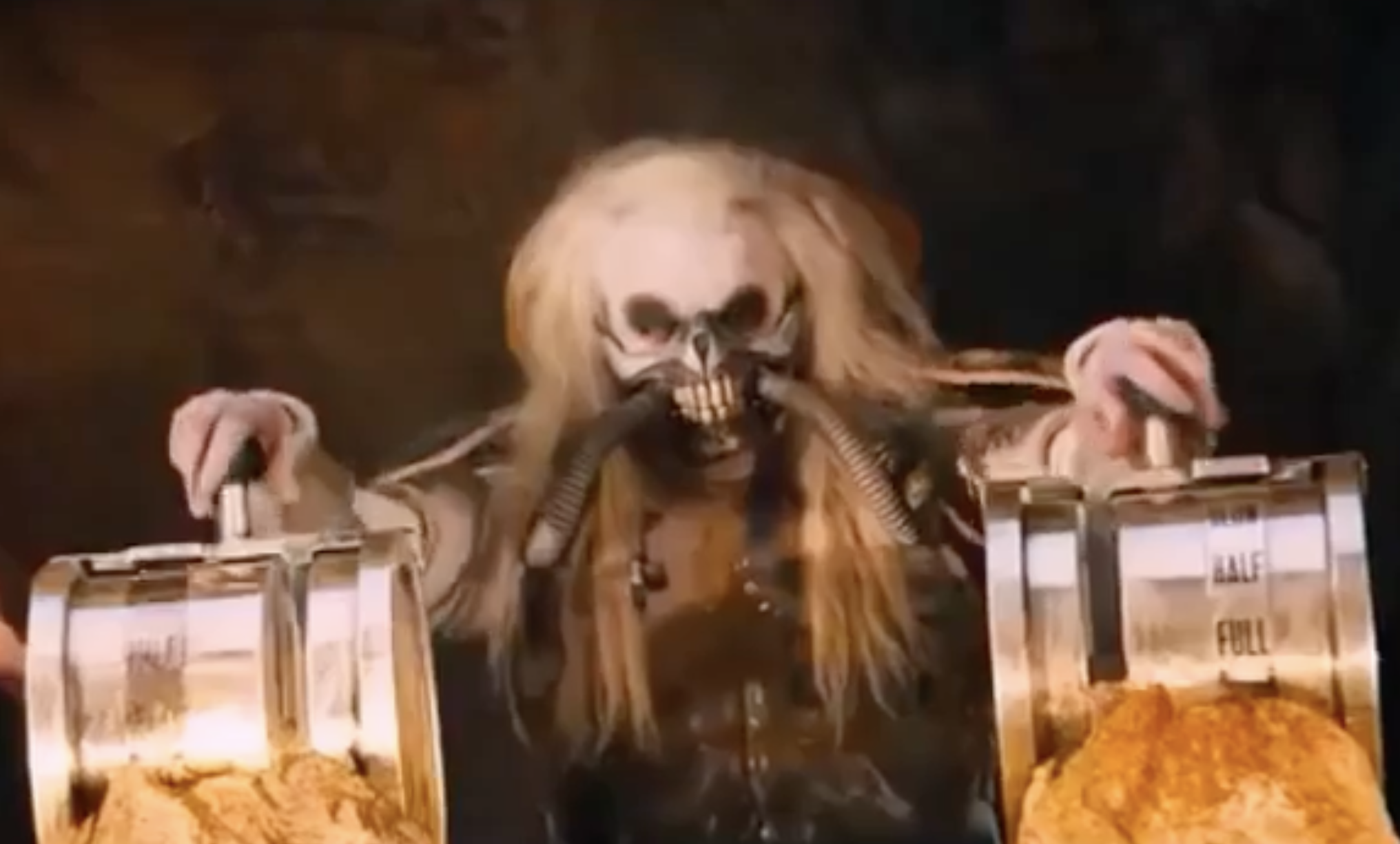 An image of Immortan Joe from Mad Max: Fury Road getting ready to turn on the tap